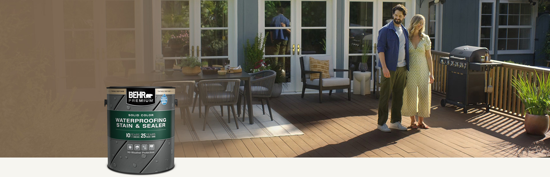 One can of Behr Premium Semi-Transparent wood stain with a wooden deck in the background